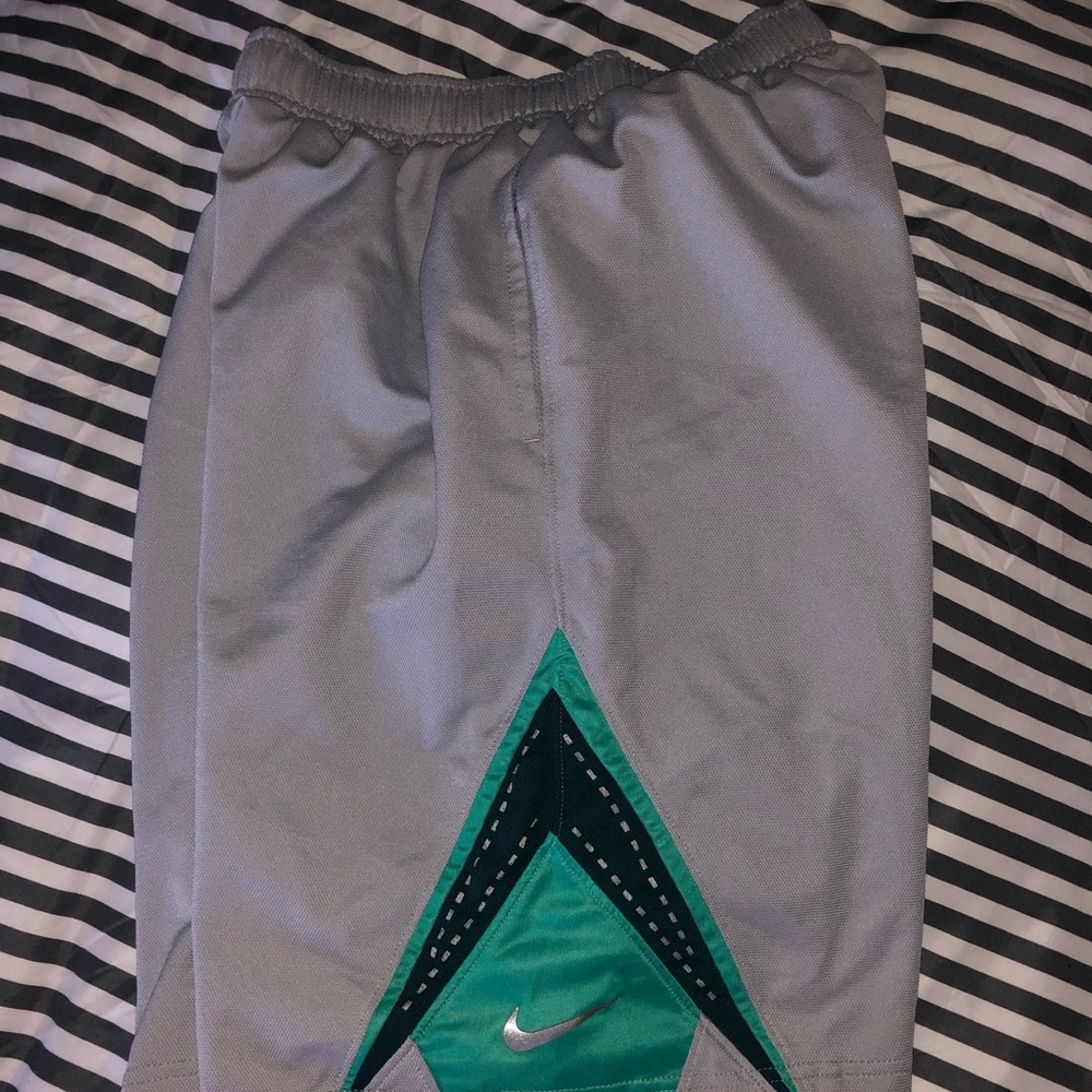 Grey and teal boys Nike shorts size Large